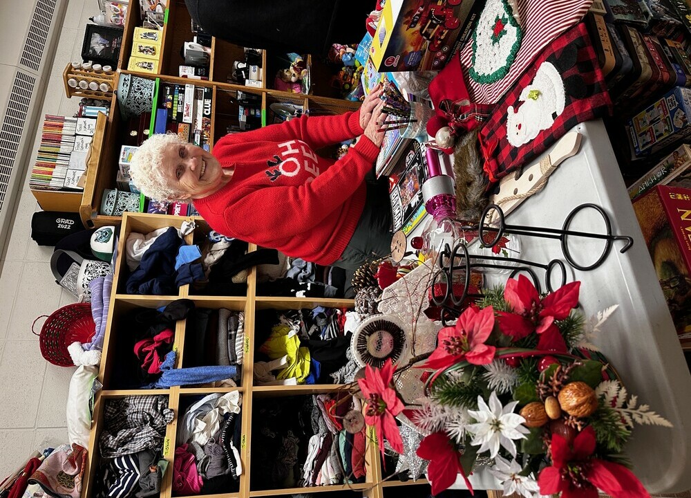 Woman working in Christmas Store